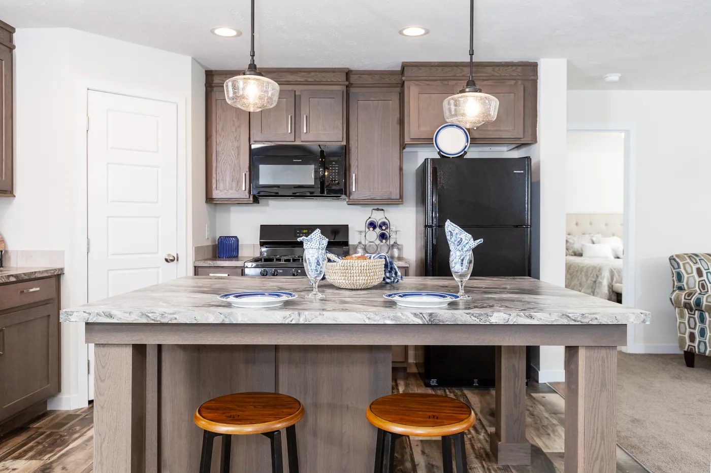 The SOMERSET DR 5228-MS012 SECT Kitchen. This Manufactured Mobile Home features 3 bedrooms and 2 baths.