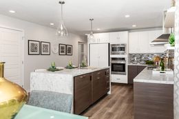 The TAYLOR 6430-9062 SECT Kitchen. This Manufactured Mobile Home features 3 bedrooms and 2 baths.