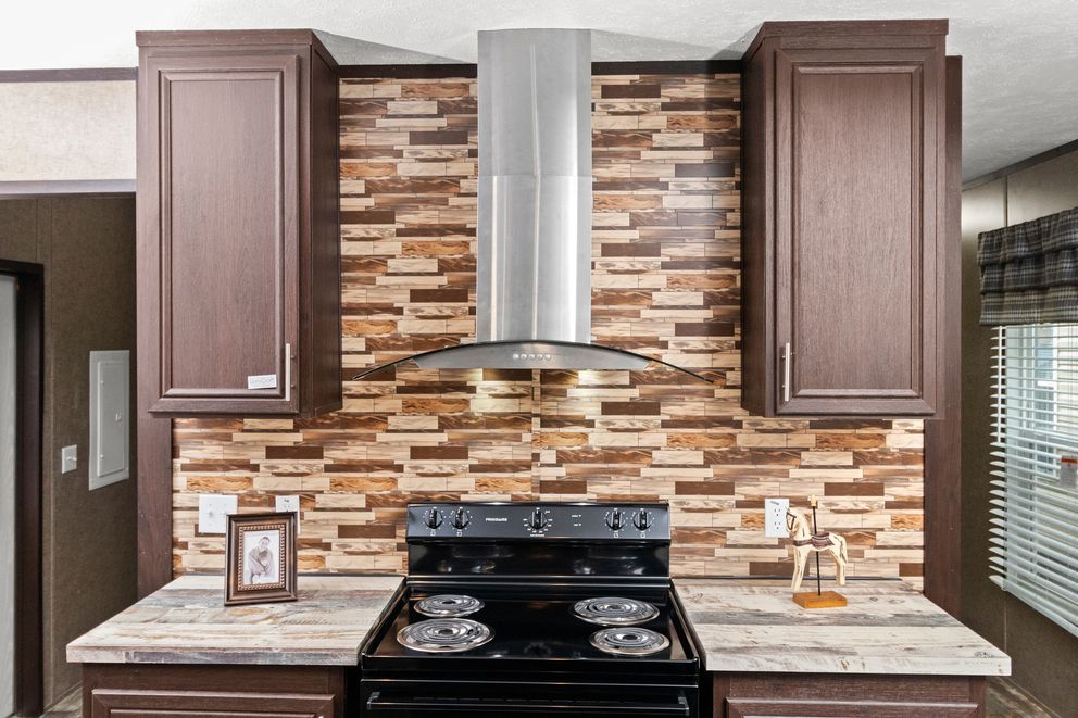 The THE PARKSIDE Kitchen. This Manufactured Mobile Home features 3 bedrooms and 2 baths.