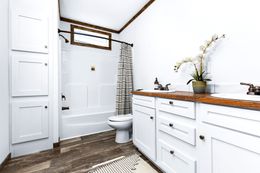 The THE DAISY-MAE Guest Bathroom. This Manufactured Mobile Home features 3 bedrooms and 2 baths.