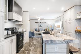 The THE SOUTHERN FARMHOUSE Kitchen. This Manufactured Mobile Home features 3 bedrooms and 2 baths.
