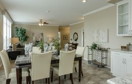 The TRANQUILITY TR3062A Dining Area. This Manufactured Mobile Home features 3 bedrooms and 2 baths.