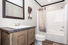 The BOUJEE Guest Bathroom. This Manufactured Mobile Home features 3 bedrooms and 2 baths.