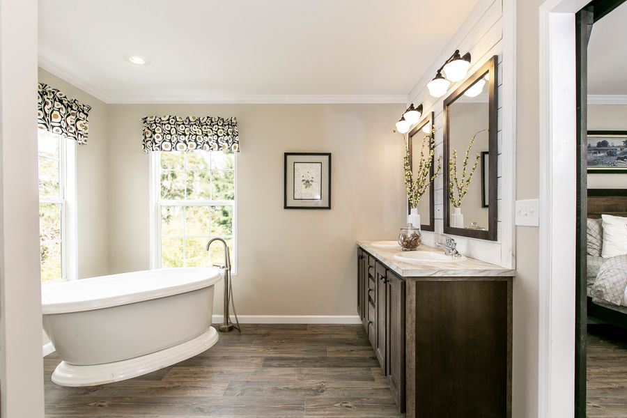 The FREEDOM FARM HOUSE  32X60 Primary Bathroom. This Manufactured Mobile Home features 3 bedrooms and 2 baths.
