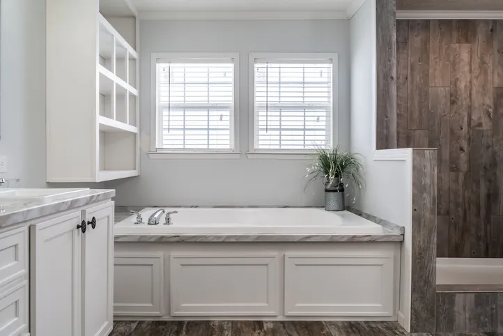 The THE LEAHY Primary Bathroom. This Manufactured Mobile Home features 4 bedrooms and 2 baths.
