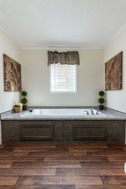 The WINCHESTER FLEX Primary Bathroom. This Manufactured Mobile Home features 4 bedrooms and 2 baths.