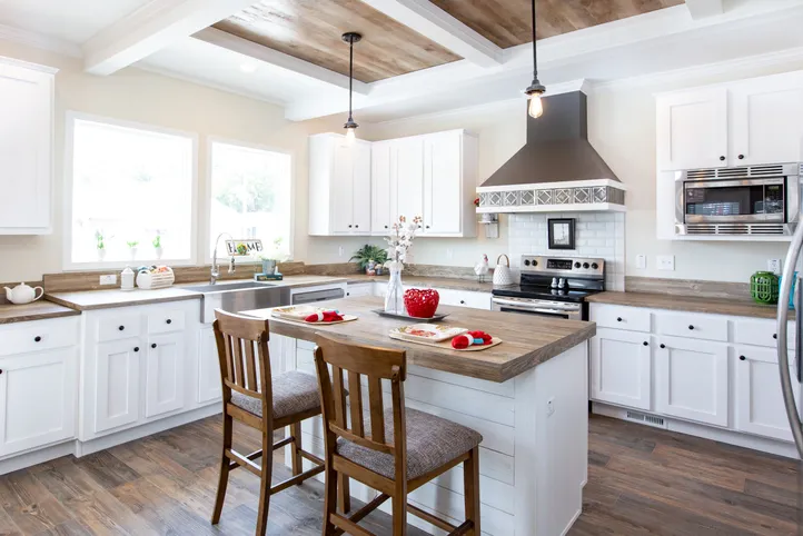 The SOUTHERN CHARM Kitchen. This Manufactured Mobile Home features 3 bedrooms and 2 baths.