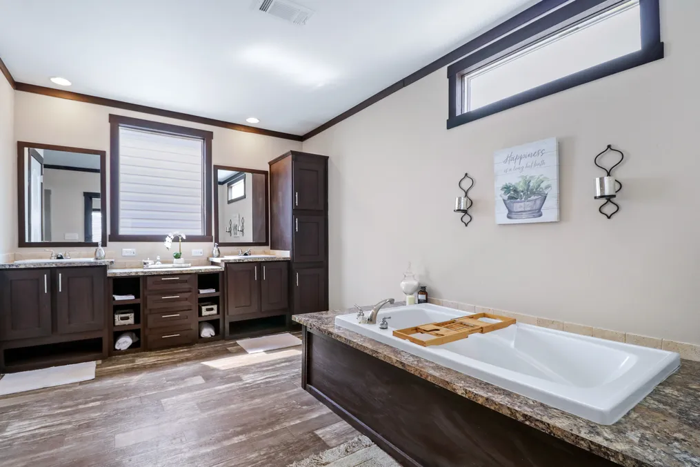 The THE DESTIN Primary Bathroom. This Manufactured Mobile Home features 4 bedrooms and 3 baths.