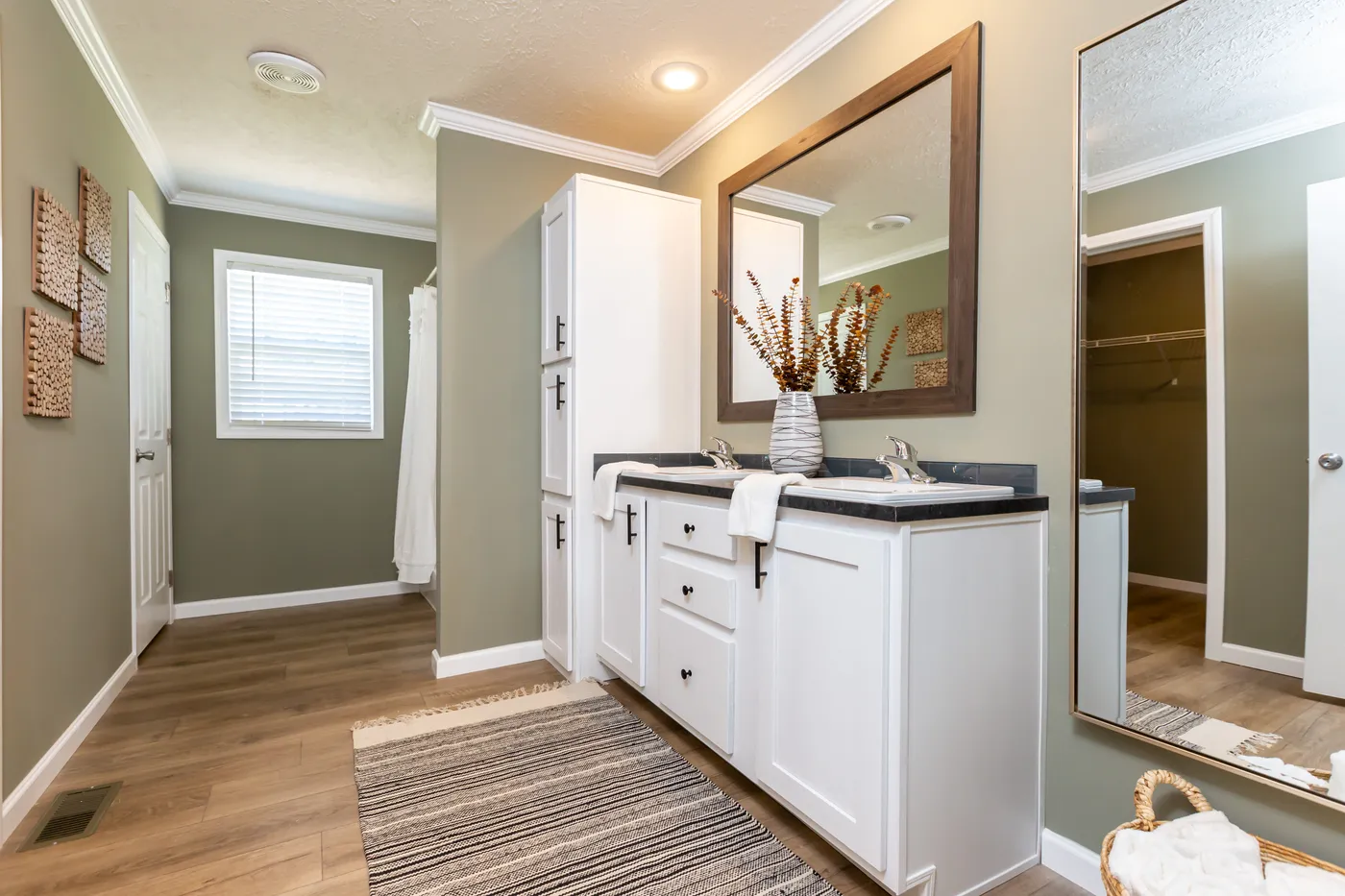 The KEENELAND Primary Bathroom. This Manufactured Mobile Home features 3 bedrooms and 2 baths.