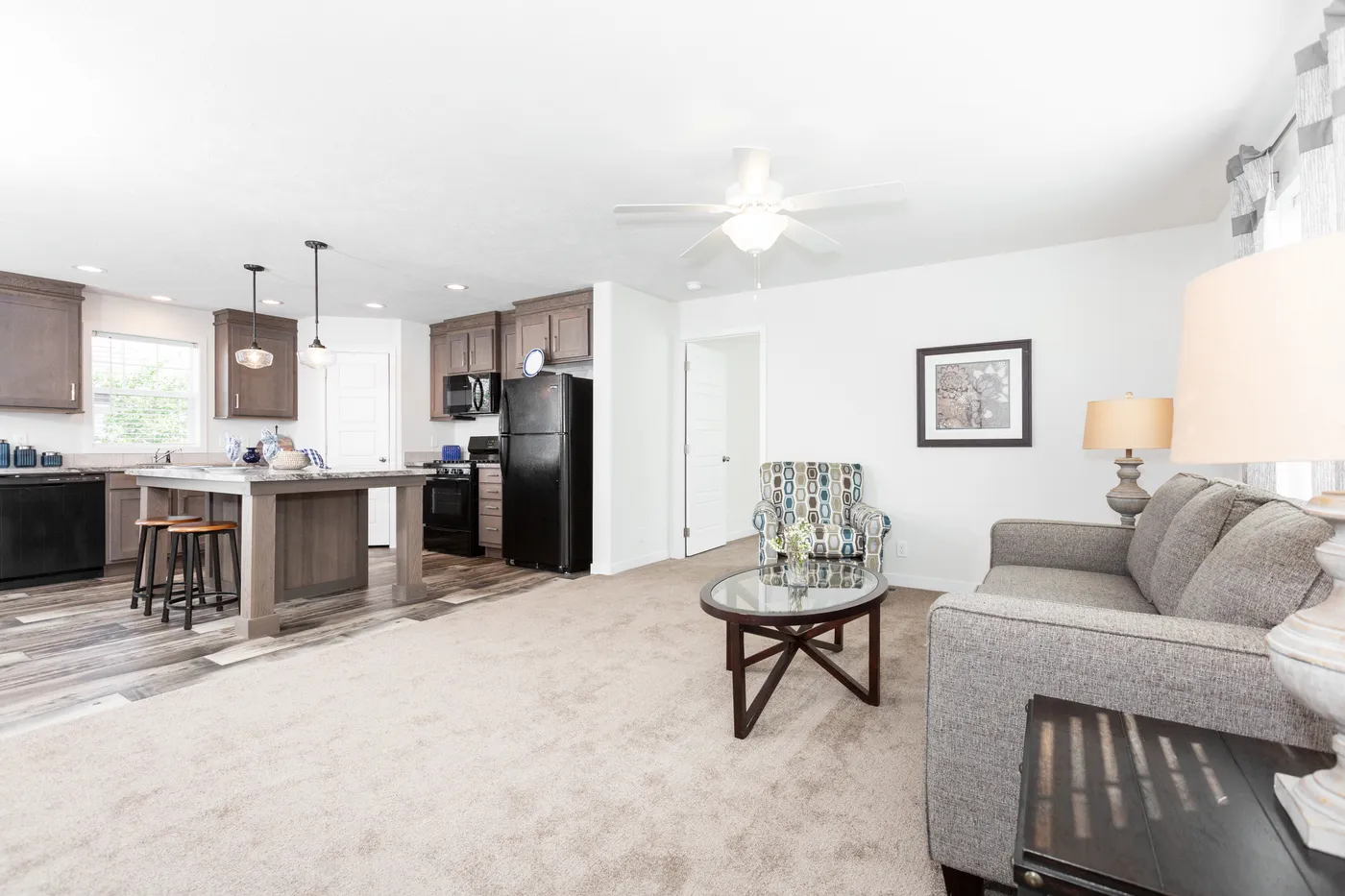 The SOMERSET DR 5228-MS012 SECT Living Room. This Manufactured Mobile Home features 3 bedrooms and 2 baths.