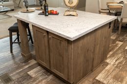 The ELITE COMMANDER 32X76 4 BR Kitchen. This Manufactured Mobile Home features 4 bedrooms and 2 baths.