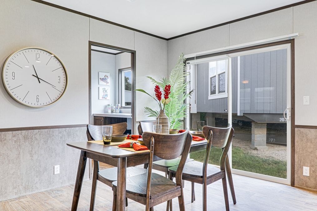 The THE ANNIVERSARY 2.1 Dining Room. This Manufactured Mobile Home features 3 bedrooms and 2 baths.