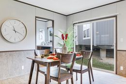 The THE ANNIVERSARY 2.1 Dining Room. This Manufactured Mobile Home features 3 bedrooms and 2 baths.