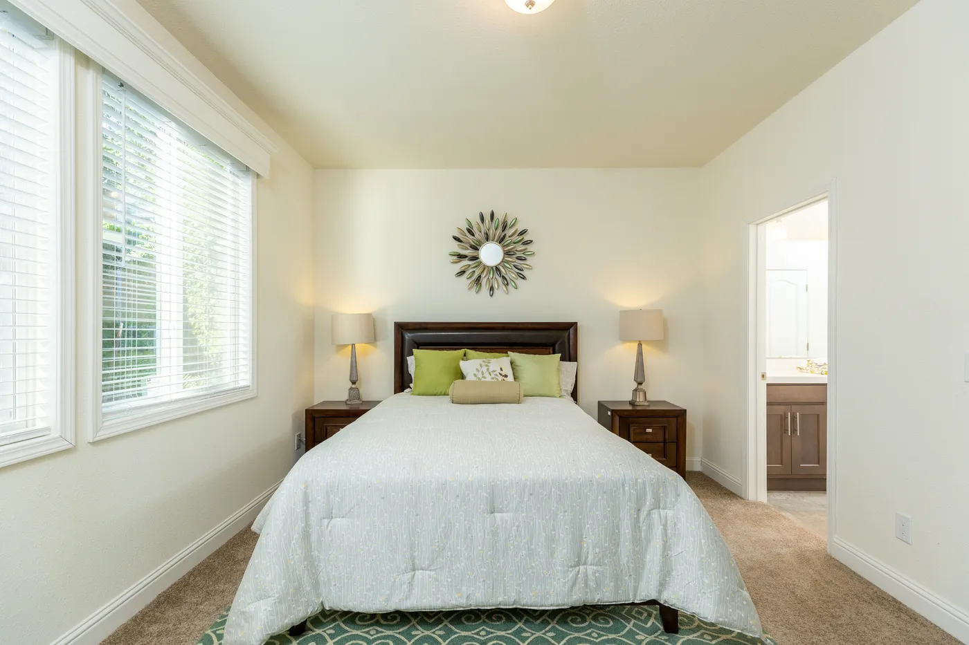 The FAIRPOINT 24564A Primary Bedroom. This Manufactured Mobile Home features 4 bedrooms and 2 baths.