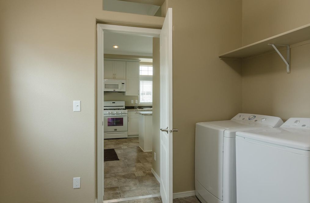 The TRANQUILITY TR3062A Utility Room. This Manufactured Mobile Home features 3 bedrooms and 2 baths.