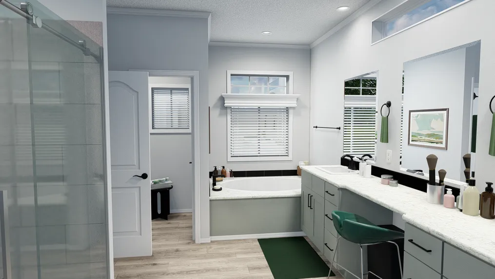 The SUM3076A Primary Bathroom. This Manufactured Mobile Home features 4 bedrooms and 2.5 baths.