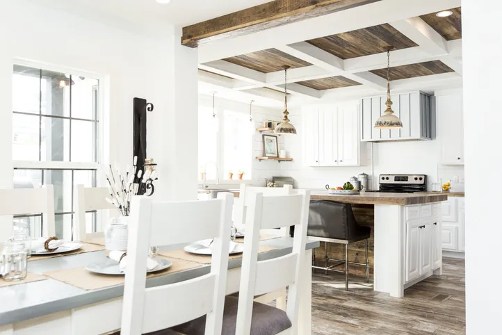 The THE LULABELLE Dining Room. This Manufactured Mobile Home features 4 bedrooms and 3 baths.