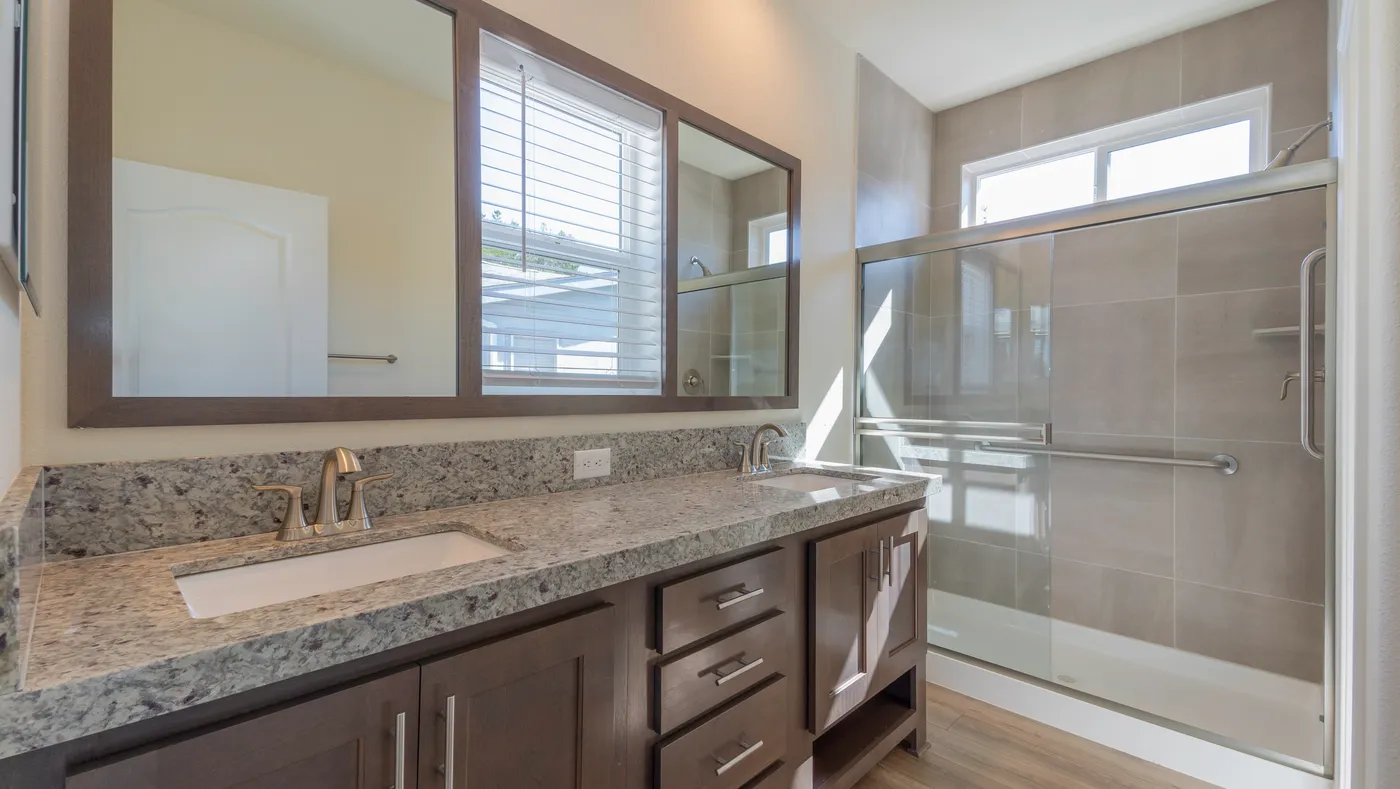 The CORONADO 2456B Primary Bathroom. This Manufactured Mobile Home features 3 bedrooms and 2 baths.