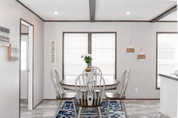 The HAWTHORNE Dining Area. This Manufactured Mobile Home features 3 bedrooms and 2 baths.