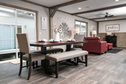 The FARMHOUSE 4 Dining Area. This Manufactured Mobile Home features 4 bedrooms and 2 baths.