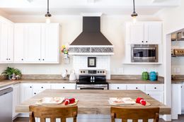 The SOUTHERN CHARM 4 BR Kitchen. This Manufactured Mobile Home features 4 bedrooms and 2 baths.