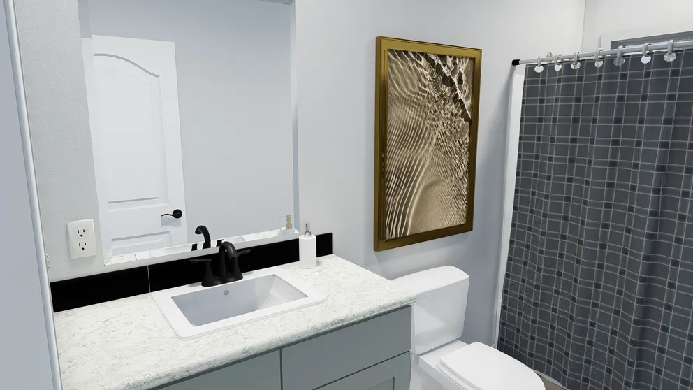 The SUM3076A Guest Bathroom. This Manufactured Mobile Home features 4 bedrooms and 2.5 baths.