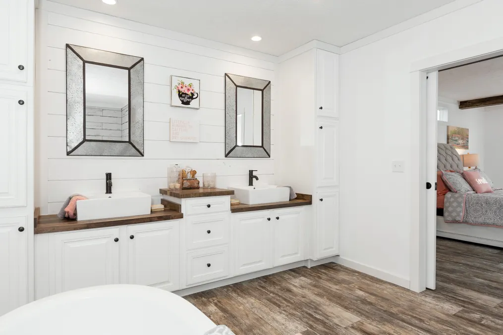 The THE LULABELLE Primary Bathroom. This Manufactured Mobile Home features 4 bedrooms and 3 baths.