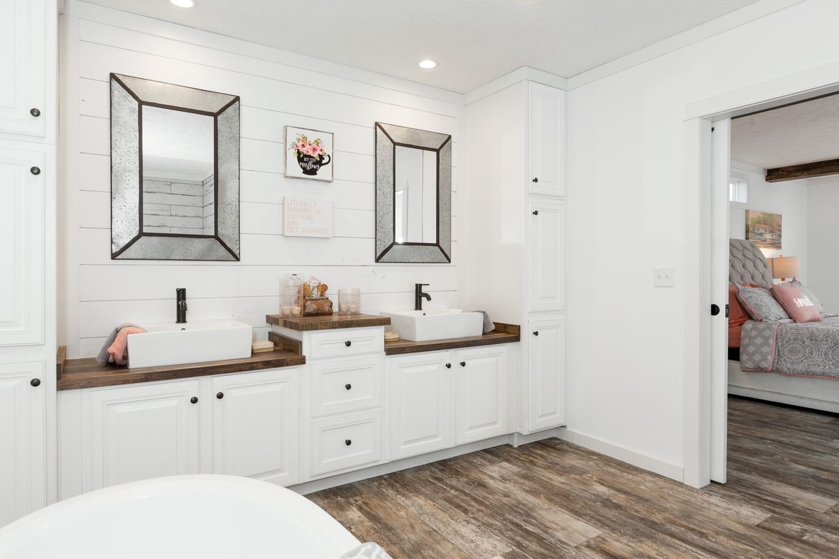 The THE LULABELLE Master Bathroom. This Manufactured Mobile Home features 4 bedrooms and 3 baths.