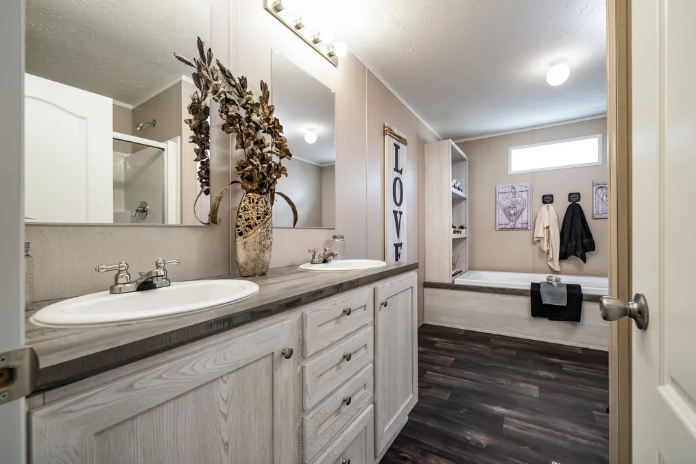 The ULTRA PRO BIG BOY Primary Bathroom. This Manufactured Mobile Home features 4 bedrooms and 2 baths.