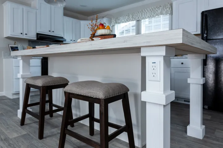 The THE FREEDOM BREEZE Kitchen. This Manufactured Mobile Home features 3 bedrooms and 2 baths.