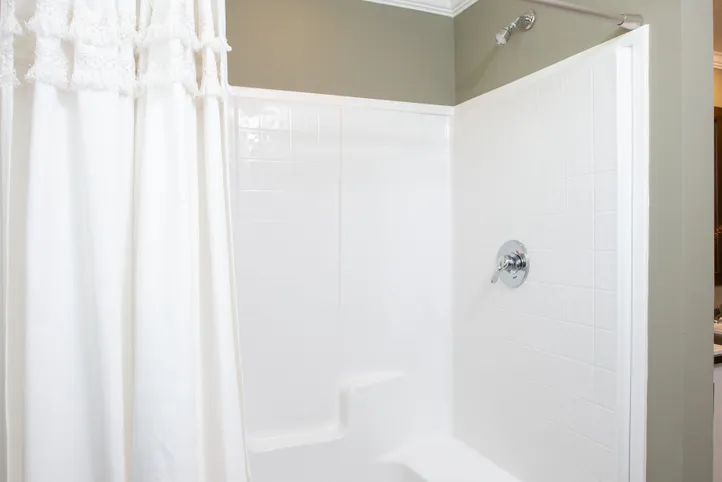 The KEENELAND Primary Bathroom. This Manufactured Mobile Home features 3 bedrooms and 2 baths.