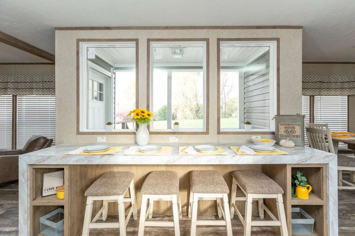 The THE RANCH HOUSE Dining Area. This Manufactured Mobile Home features 3 bedrooms and 2 baths.