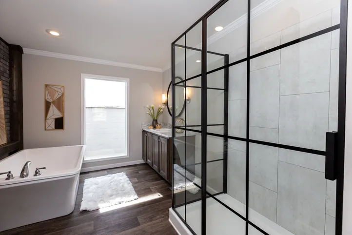 The THE FREEDOM SOHO Primary Bathroom. This Manufactured Mobile Home features 3 bedrooms and 2 baths.