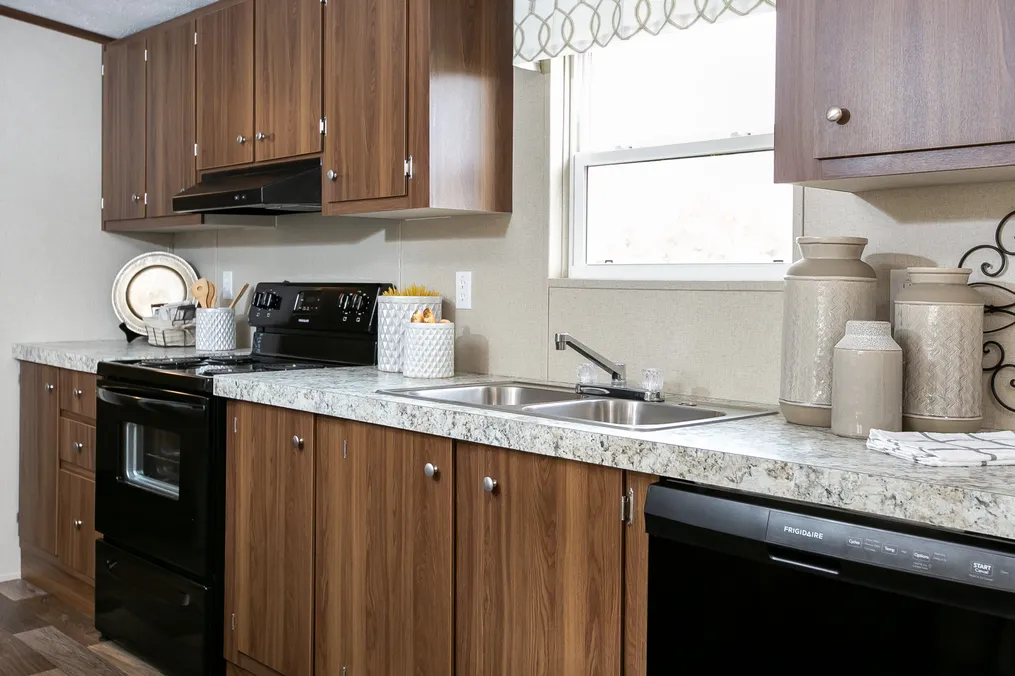 The TRIUMPH Kitchen. This Manufactured Mobile Home features 5 bedrooms and 3 baths.