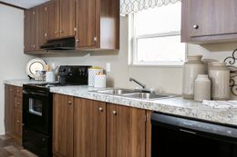 The TRIUMPH Kitchen. This Manufactured Mobile Home features 5 bedrooms and 3 baths.