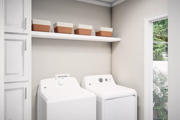The THE VALHALLA Utility Room. This Manufactured Mobile Home features 3 bedrooms and 2 baths.