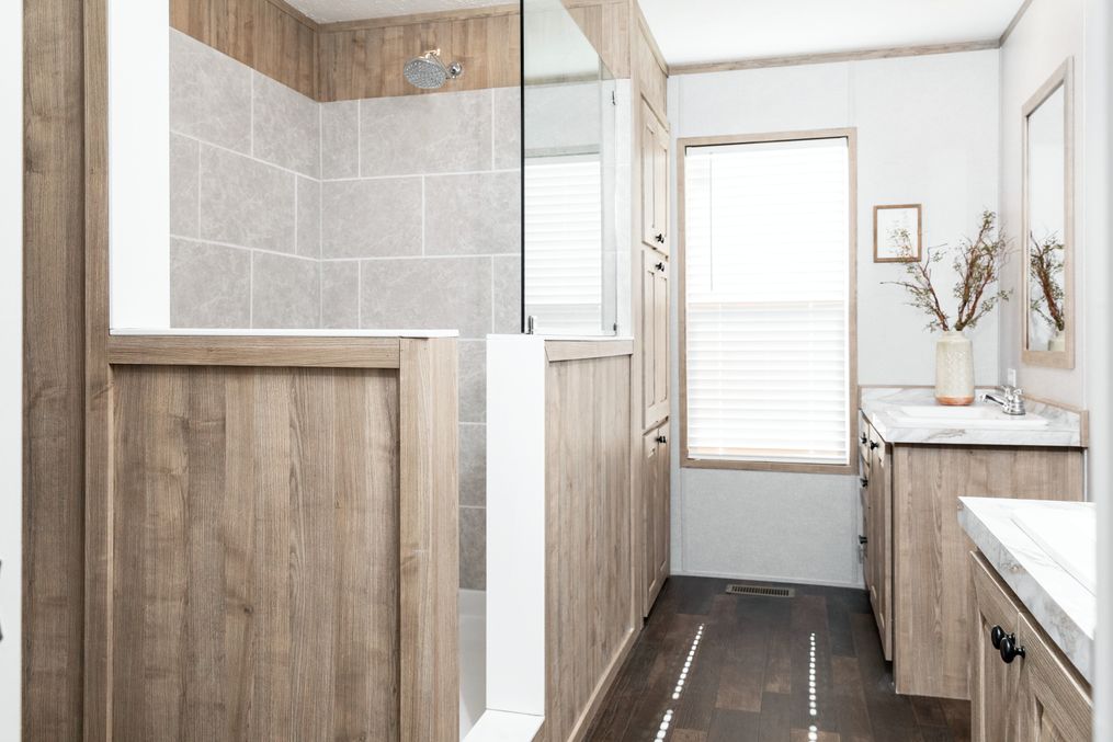 The THE 1959 Master Bathroom. This Manufactured Mobile Home features 3 bedrooms and 2 baths.