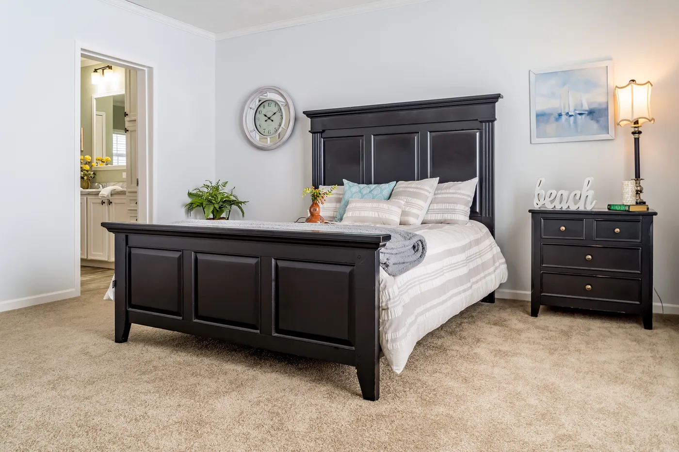 The THE INGRAM Guest Bedroom. This Manufactured Mobile Home features 3 bedrooms and 2 baths.