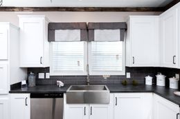 The THE MCGARRITY Kitchen. This Manufactured Mobile Home features 4 bedrooms and 2 baths.