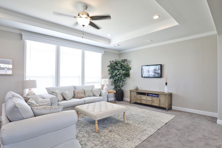 The EDGEWOOD Living Room. This Manufactured Mobile Home features 3 bedrooms and 2 baths.