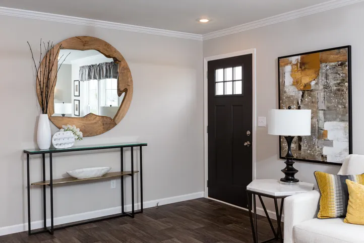 The THE FREEDOM SOHO Living Room. This Manufactured Mobile Home features 3 bedrooms and 2 baths.