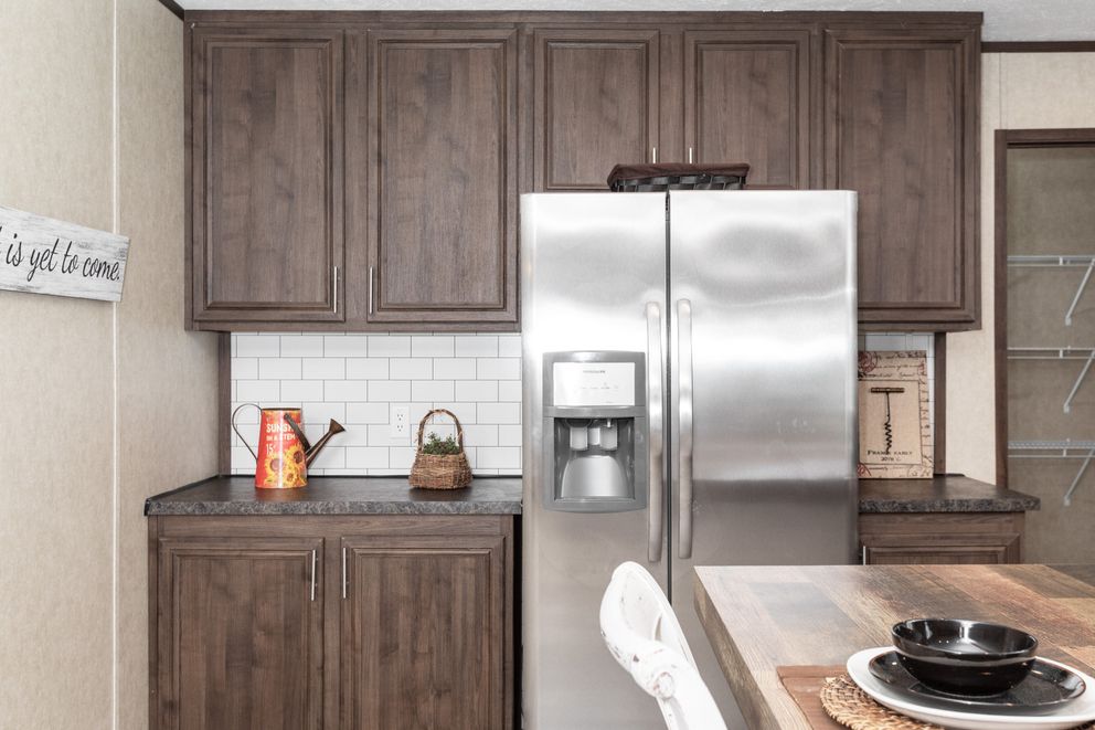 The THE RIVERWAY Kitchen. This Manufactured Mobile Home features 4 bedrooms and 2 baths.