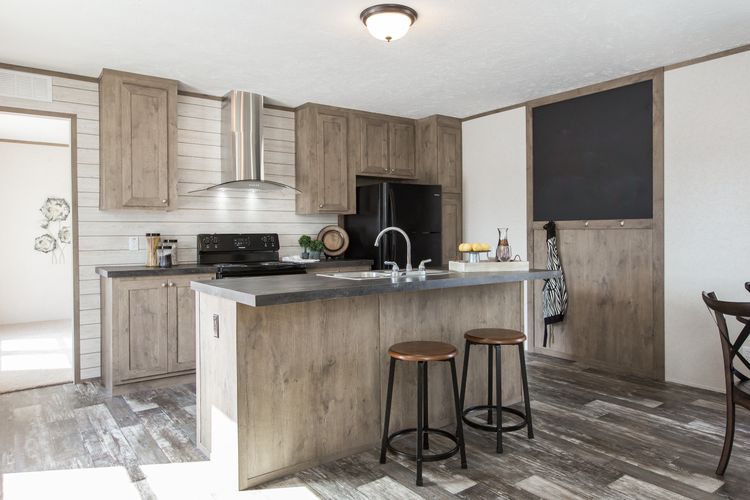 The THE BREEZE Kitchen. This Manufactured Mobile Home features 3 bedrooms and 2 baths.