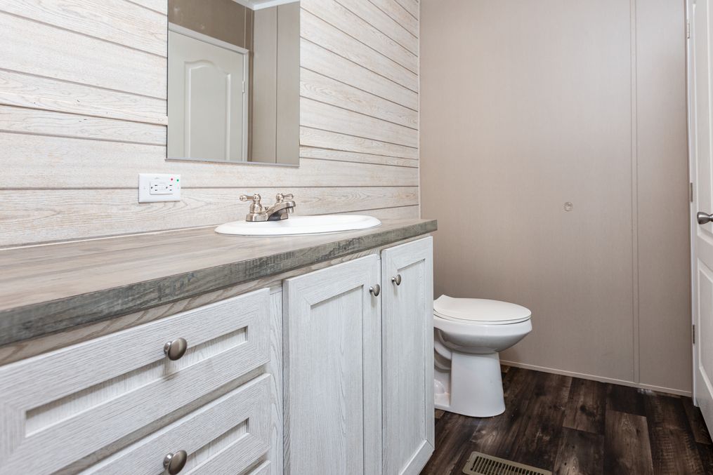 The ANNIVERSARY PLUS 72 Master Bathroom. This Manufactured Mobile Home features 3 bedrooms and 2 baths.