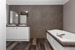 The TRADITION 76C Primary Bathroom. This Manufactured Mobile Home features 4 bedrooms and 2 baths.