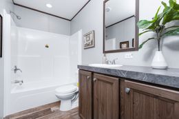 The CRAZY EIGHTS Guest Bathroom. This Manufactured Mobile Home features 4 bedrooms and 2 baths.