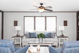 The HAWTHORNE Living Room. This Manufactured Mobile Home features 3 bedrooms and 2 baths.