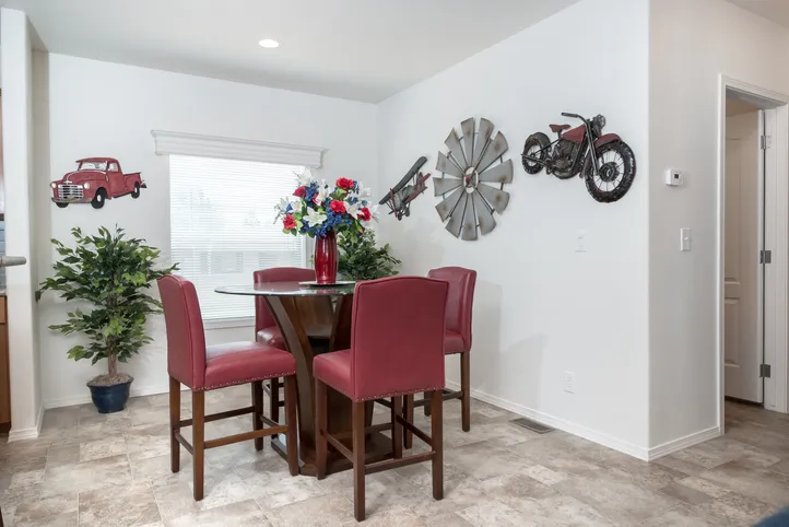 The K2760A Dining Area. This Manufactured Mobile Home features 3 bedrooms and 2 baths.