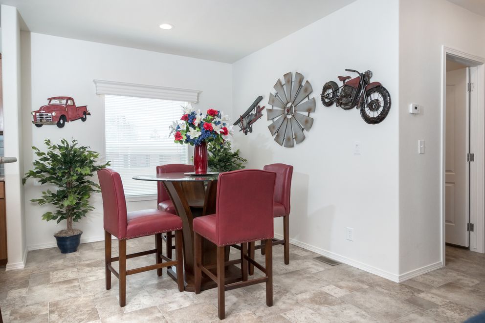 The K2760A Dining Area. This Manufactured Mobile Home features 3 bedrooms and 2 baths.