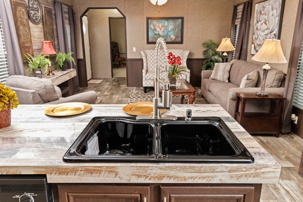 The THE PARKSIDE Kitchen. This Manufactured Mobile Home features 3 bedrooms and 2 baths.
